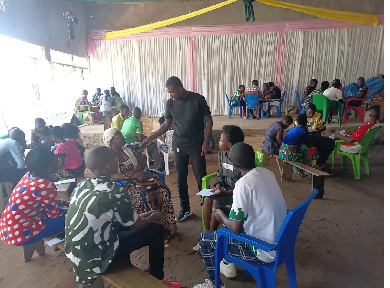Fount Hub trainer with young participants in Rumonge